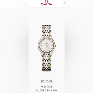 TheOMEGADeVillePrestigeclassic
features a two-tone mother-of-pearl dial/diamonds